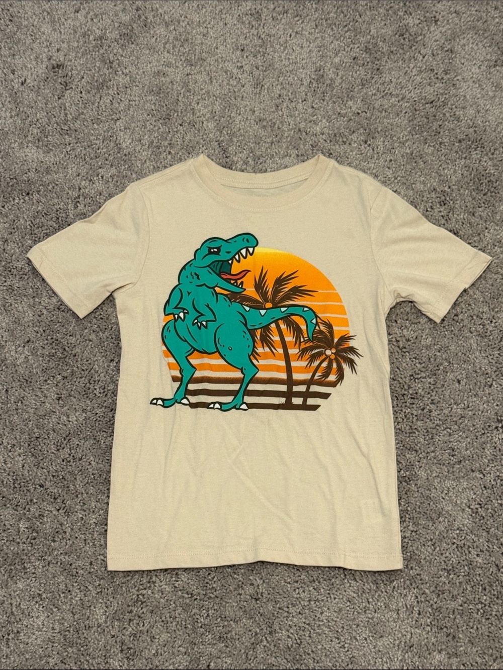 wonder nation Cream Tee with Teal Dino and Orange Sunset